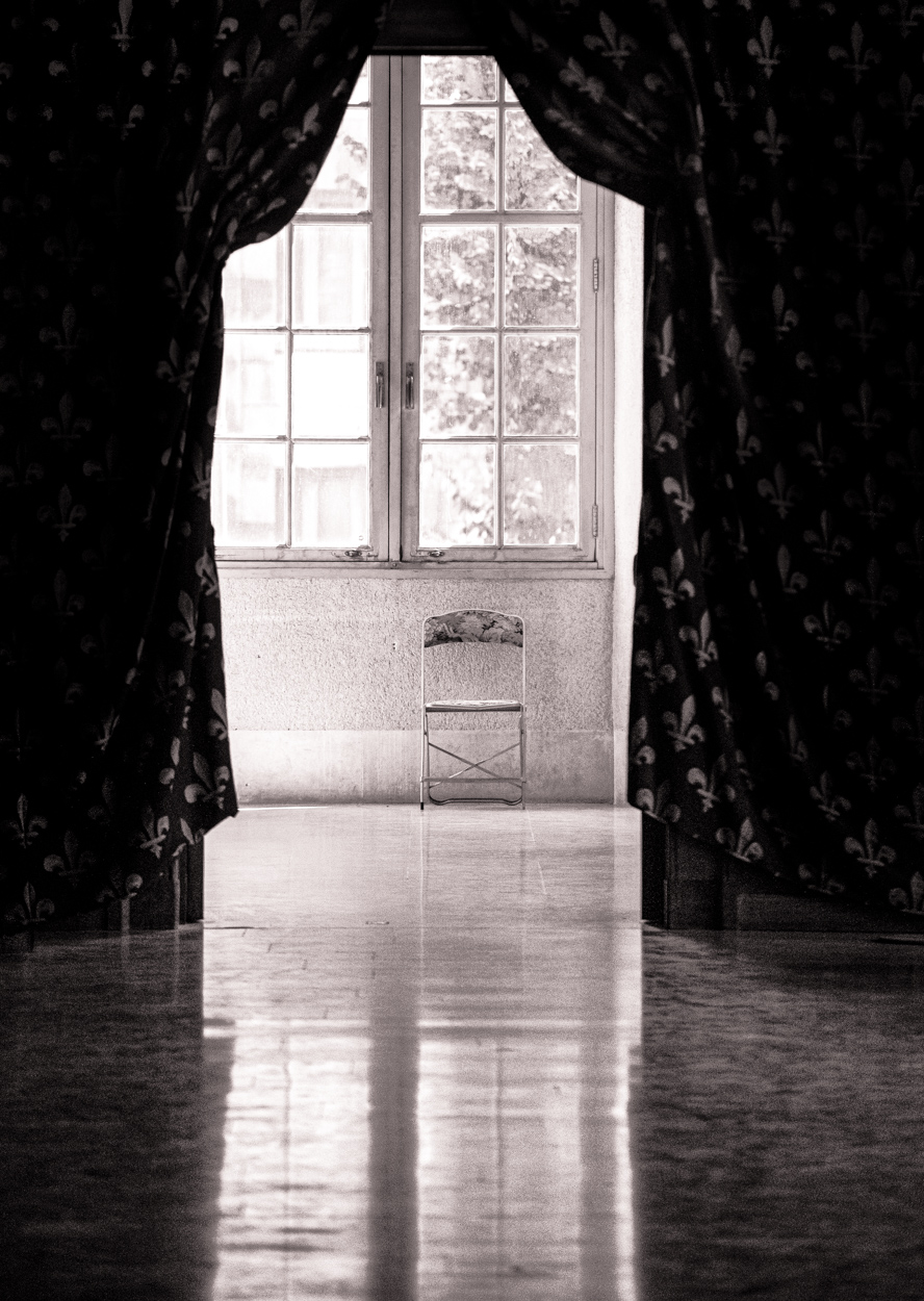 The Window, the Chair, and the Curtain